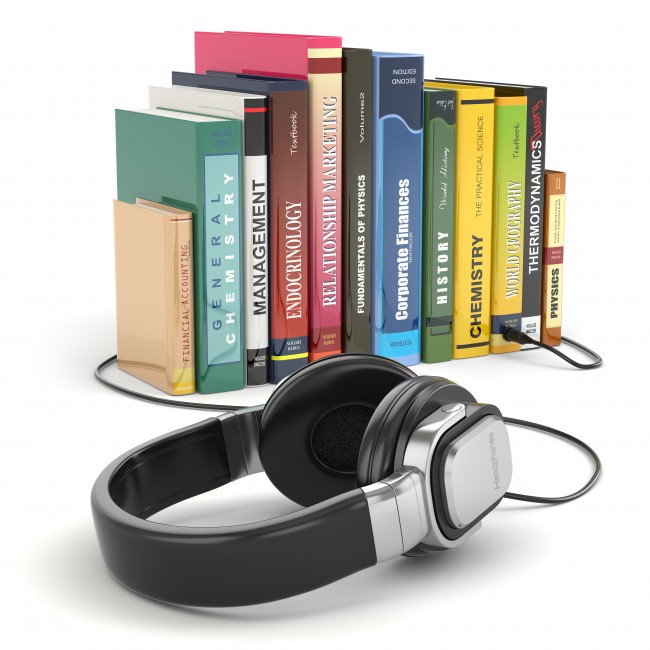 Audiobook concept. Headphones and books